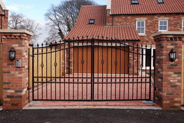 Swinging gate installed at a residential property entrance