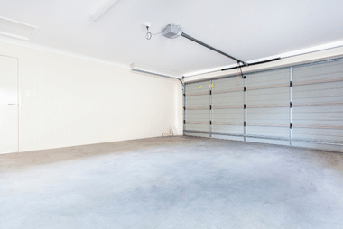 Commercial sectional garage door for a warehouse or factory