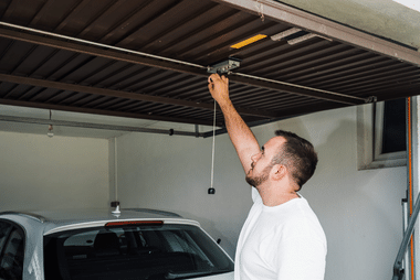 Sectional garage door built from durable steel panels