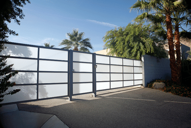 Custom privacy gate providing screening at a residential property
