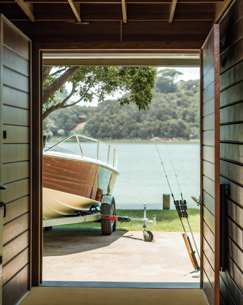 Australian waterfront suburban home with a wide garage door